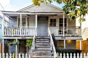 New Orleans, USA - April 22, 2018: Old Dauphine street district in Louisiana famous town with antique house